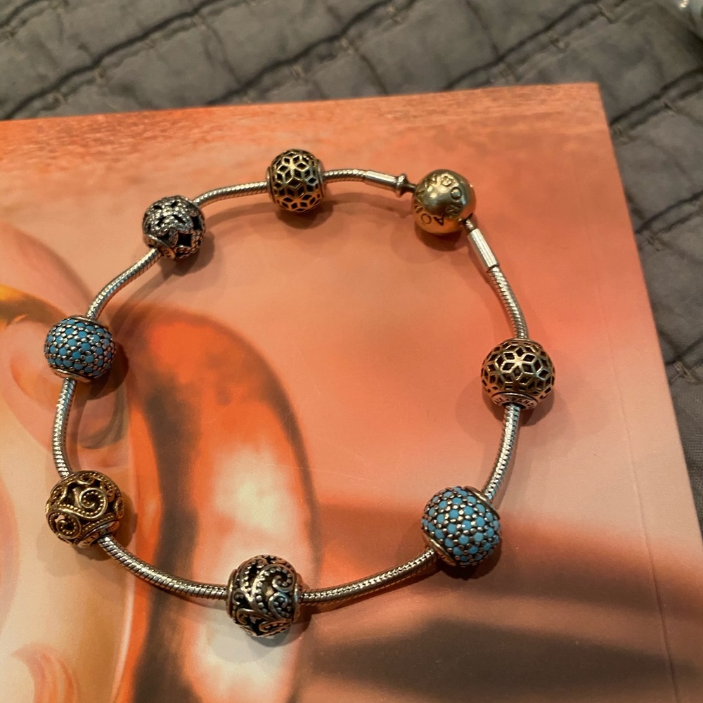 Pandora Essence two tone bracelet with 7 beads